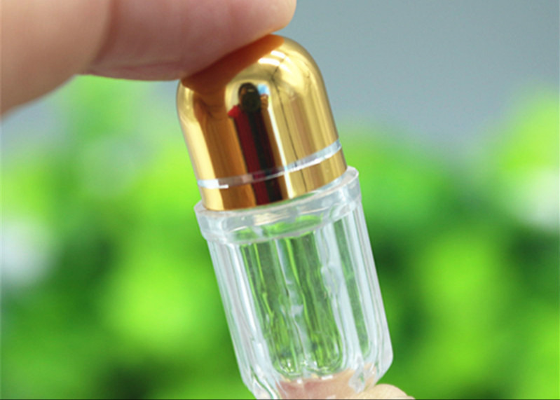 China 5g Golden Capsule Packaging Bottles Single Pill Cylinder Shape factory