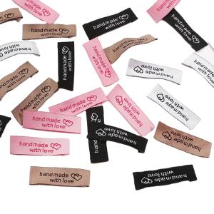 China Custom Garment Tags And Labels , Folded Clothing Woven Labels factory