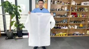 China S&amp;J OEM Wholesale Nonwoven White Medical PP Cheap Disposable Surgery Lab Coats with Pockets factory
