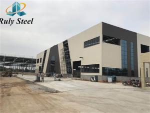 China Prefabricated Multi Storey Steel Frame Construction With Crane factory