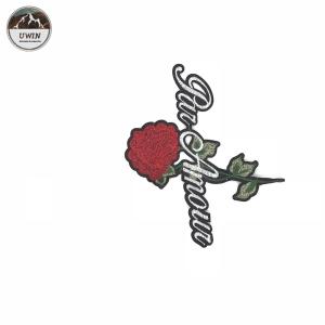 China Trendy Alphabet Embroidery Designs Patches With Black Flocked Backing Design factory