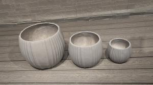 China Modern Round Hand Carved Decor Planters for Indoor Outdoor Hotel Decoration factory