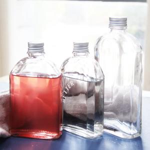China Top Quality Thickening Cold Beverage Liquor Glass Bottle With Aluminum Lid factory