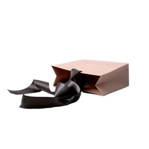 China Luxury Printed Custom Logo Clothing Gift Paper Packaging Bags with Hand Length Handle factory