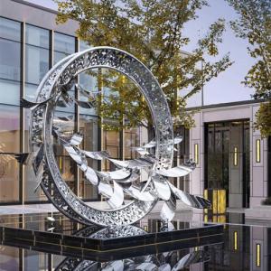 China Circle Decorative Art Sculpture Mirror Stainless Steel Hollow Garden Statues factory