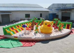 China 10x10m Big yellow duck inflatable theme park with sun beach sofa for entertainment factory