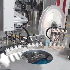 China 220V Silica Gel Desiccant Cap Assembly Machine with PLC Control on sale