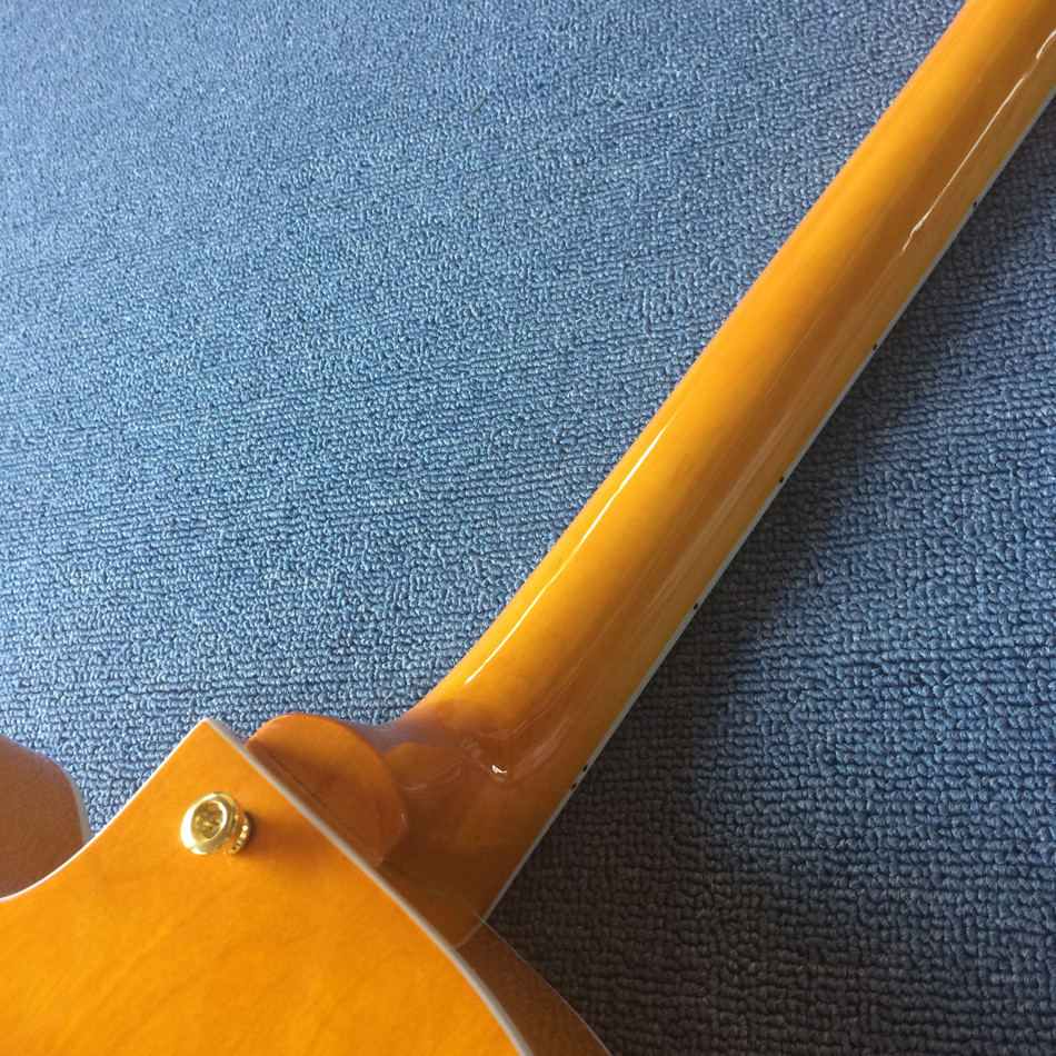 New style high-quality hollow body jazz electric guitar, Double F holes,Tremolo system ,Flame Maple top