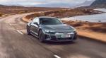 a low, long, wide and lean looking four-door car at 2023Audi e-Tron GT pure