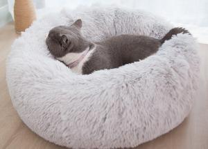 China Warm Plush Soft Donut Cats Dogs Bed Faux Fur Dog Calming Bed factory
