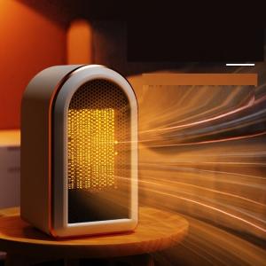 China Desktop 1200W Quick Heating PTC Small Electronic Foot Household Personal Space Heater factory