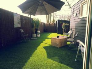 China Flooring Grass Carpet Garden Artificial Turf 35mm Height Fire Resistance factory