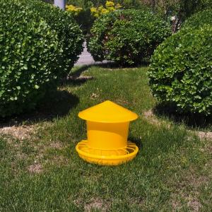 China Thick Yellow Poultry Feeding Bucket Farm Feeder Pigeon Chick Feeding Equipment Sturdy Durable Round Design factory