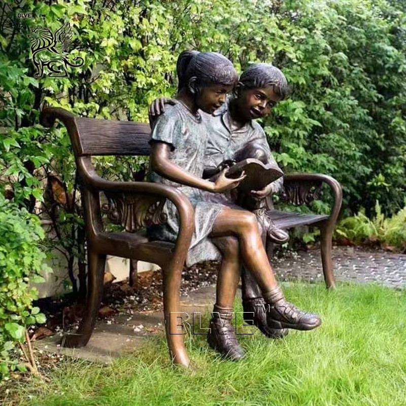 China BLVE Life Size Boy And Girl Reading Bronze Statues On Bench Park Metal Garden Decoration Sculpture factory