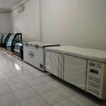 Stainless steel commercial refrigerator workbench in the back kitchen of hotel
