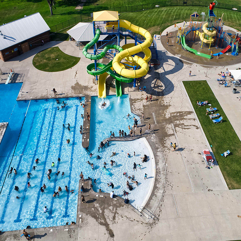 Multiple People Swim Wave Pool Open Air Outdoor Water Playground