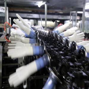 China Automatic gloves machine surgical glove machine pe gloves machine factory