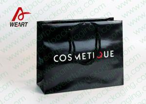 China Personalized Kraft Paper Gift Bags With Ribbon Handle Embossing Surface Finishing factory