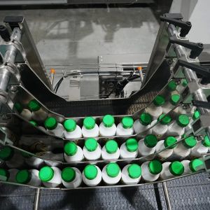 Low Speed Drop Type Wrap Around Case Packer for Bottled Water Production Line