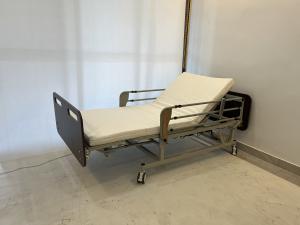 China Electric Home elderly nursing Bed with Lockable Wheels factory