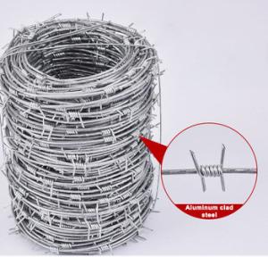 China Spacing 5'' Razor Coil Barbed Wire Security Fence PVC Coated factory