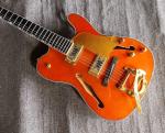 Custom orange TL hollow body f hole ebony fingerboard gold bridge electric