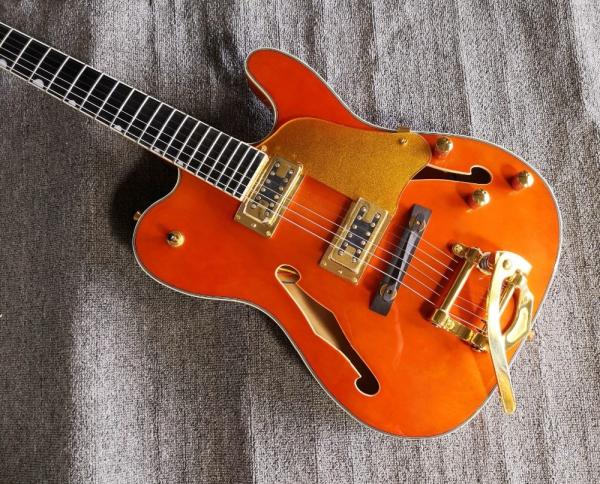 Custom orange TL hollow body f hole ebony fingerboard gold bridge electric