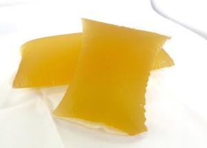 China Yellow Transparent Solid Hot Melt Adhesive For Hygienic Products Baby Diapers factory