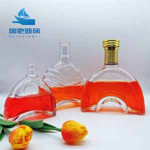 China Customized Hot Stamping 750 ml Liquor Unique Shaped Wine Glass Bottle with Cap factory