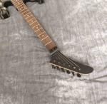 Skull Carving Body 6 Strings Electric Guitar in Matte Black Color