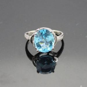 China 925 Silver 9mmX11mm Oval Blue Topaz Cubic Zircon Ring(E52) factory