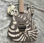 Skull Carving Body 6 Strings Electric Guitar in Matte Black Color