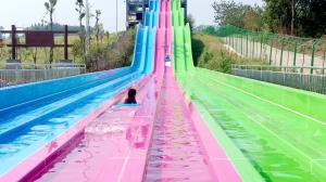 China Multi - Lanes Rainbow Custom Water Slides For Aqua Park Fiberglass Material factory