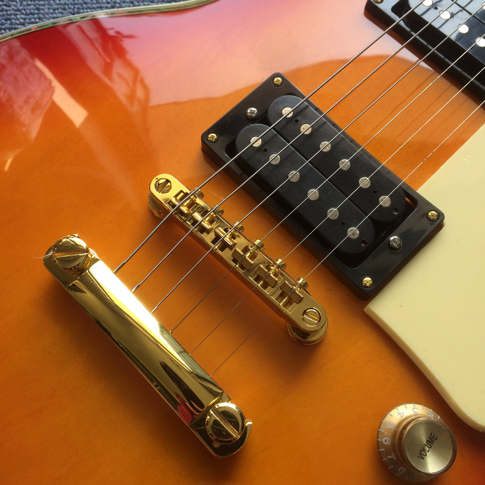 Custom Grand Solid Mahogany Body Electric Guitar in Cherryburst and with Gold Hardware