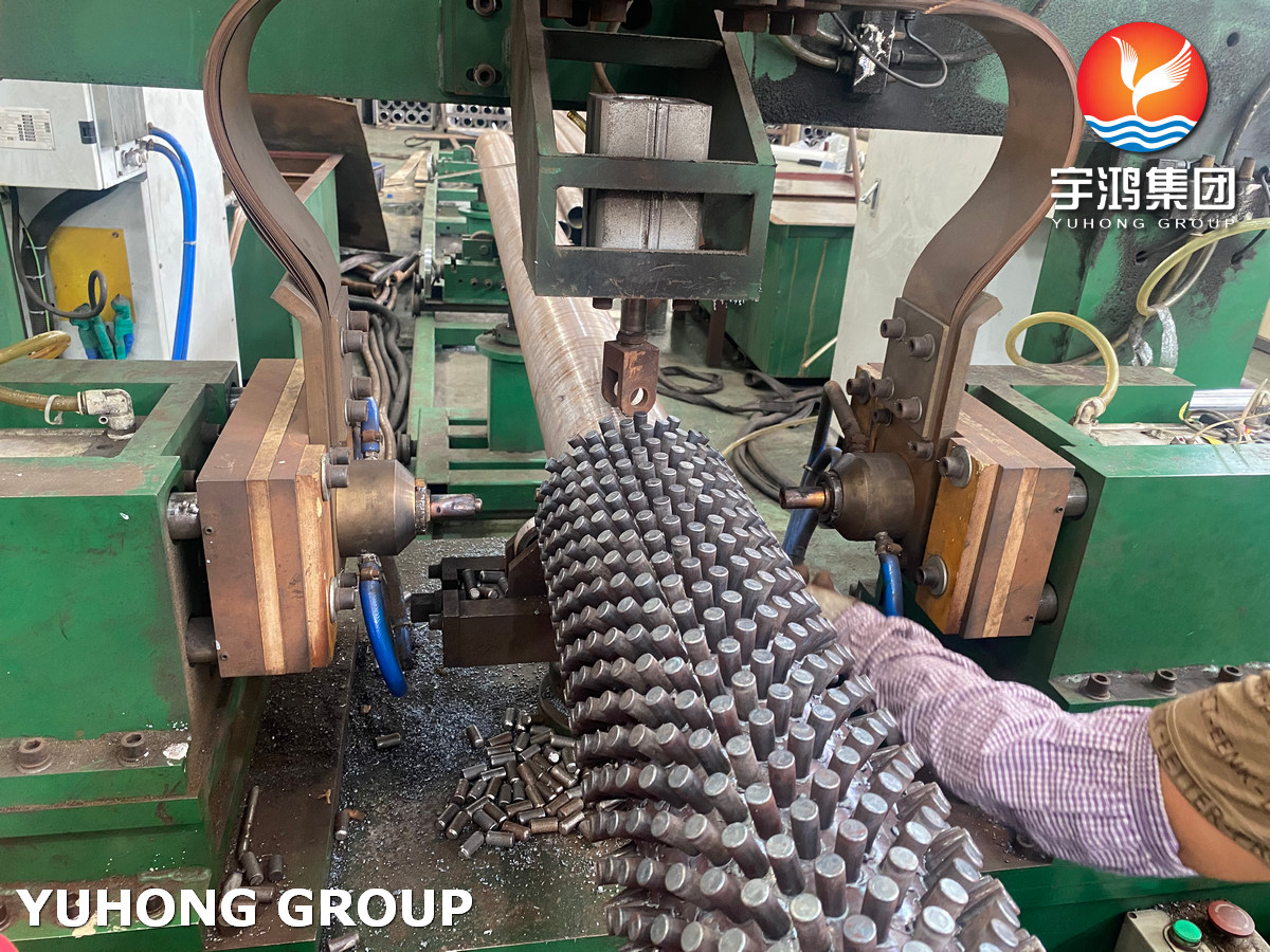 Studded fin tubes for industrial heat exchangers