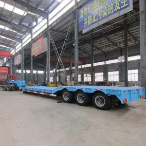 China 60 Tons Lowboy Loader Lowbed Truck Semi Trailer for Heavy Duty Equipment Transportation factory