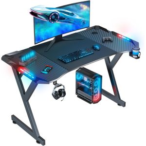 China Gaming Desk With Ergonomic Design Carbon Fiber Finish LED Lights Convenient Accessories For Living Spaces Or Gamers on sale