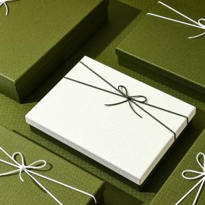 China Custom Luxury Cardboard Lid And Base Cosmetic Packaging Box Personalized Gift Box Set With Ribbon factory
