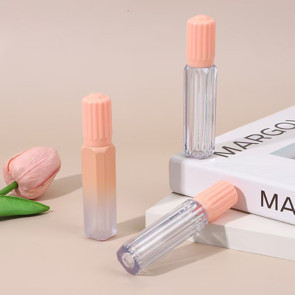 Design gear cover with brush plastic lip glaze tube in various colors