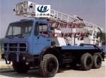 Truck mounted drilling rig in desert
