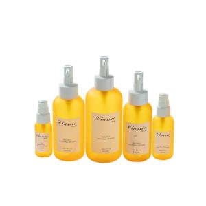 China 30/60/150/200/300ml Yellow Smooth Round-shouldered bottle with white pump for shampoo lotion bottle factory