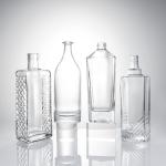 Clear Glass Liquor Bottle with Embossed Body and Cork Stopper