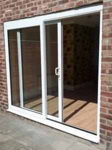 China Custom Modern PVC Sliding Doors Double Tempered Glass Patio Door factory
