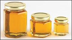 China hexagonal glass jars for honey factory