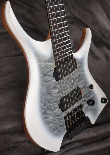 2025 Fanned Frets 7 Strings Headless Electric Guitar White Color with Eye Poplar