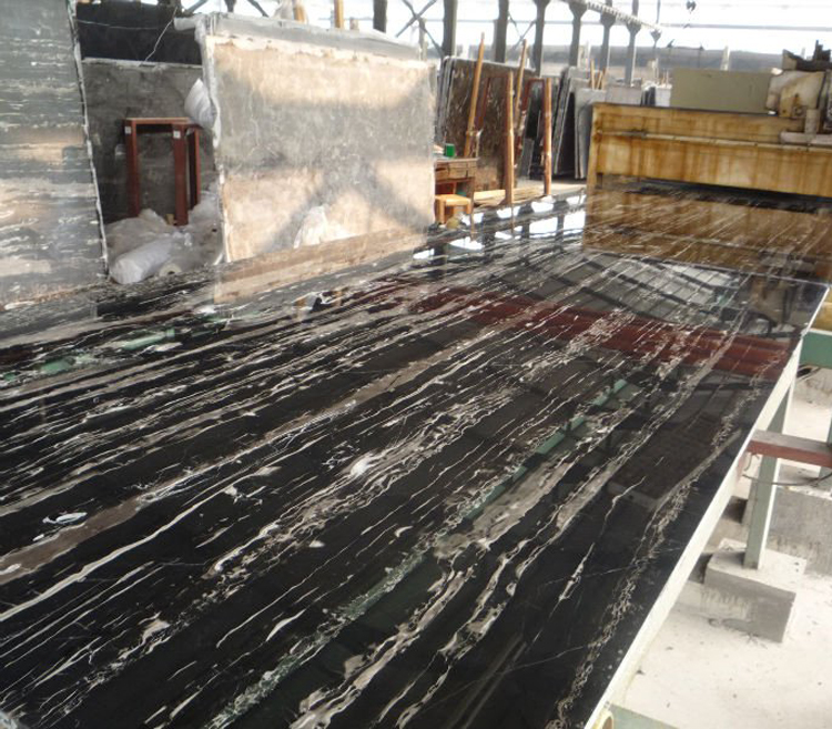 China cheap natural stone black white vein guangxi silver dragon marble slab