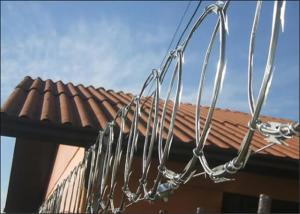 China Anti Rust Flat Wrap Razor Wire Fence With Beeline Razor Barbed Wire factory