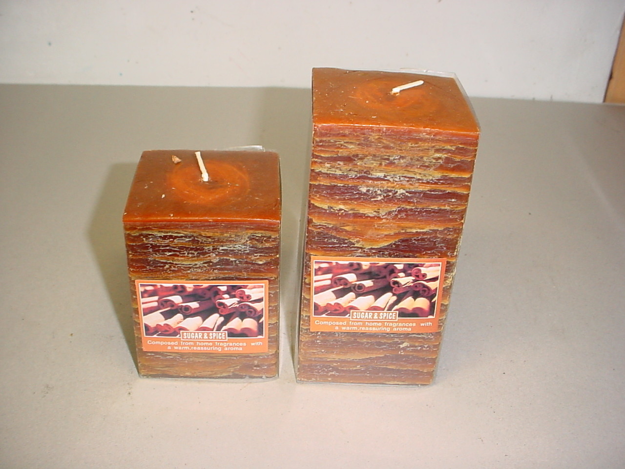 100% paraffin wax scented square pillar candle with clear wrapping and printed label