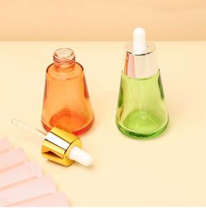 China Industrial Cosmetic Elegant 30ml 50ml 1oz 2oz Green Empty Oil Serum Dropper Bottles with Box Customize Unique Cone Shape factory