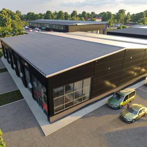 China Quick Install Prefabricated Budget Steel Warehouse Structures Metal Warehousing Solutions on sale